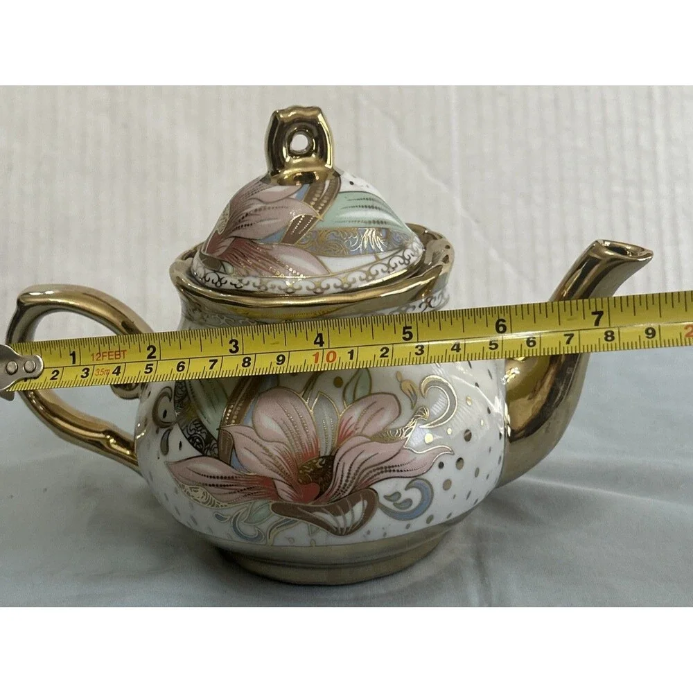 Floral Porcelain Teapot With Gold Tone Trimming
